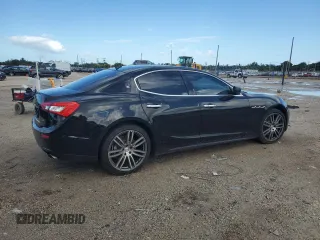 2015 Maserati Ghibli with VIN ZAM57XSA2F1129792, listed as a Copart auction lot 70717393 with 116,851 mi miles. Bid and sale history available at carsss.com. Image 3.