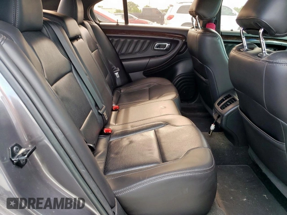 2013 Ford Taurus Limited z VIN 1FAHP2F89DG187913, wystawiony jako Copart lot #57096865 z przebiegiem 93 575 mil mil oraz Szkoda całkowita • Salvage title. Historia ofert i sprzedaży dostępna na DreamBid. Obrazek 10.
