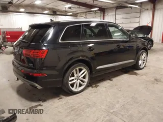 2017 Audi Q7 Prestige with VIN WA1VABF71HD043036, listed as a IAAI auction lot 42255140 with 90,009 mi miles and . Bid and sale history available at DreamBid. Image 4.