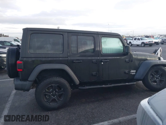 2018 Jeep Wrangler Unlimited Sport z VIN 1C4HJXDNXJW206732, wystawiony jako IAAI lot #41431655 z przebiegiem 38 949 mil mil oraz . Historia ofert i sprzedaży dostępna na DreamBid. Obrazek 13.