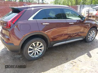 2023 Cadillac XT4 AWD Premium Luxury with VIN 1GYFZDR46PF125499, listed as a IAAI auction lot 41919403 with 44,647 mi miles and . Bid and sale history available at carsss.com. Image 4.