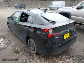 2020 Toyota Prius L Eco with VIN JTDKARFUXL3115471, listed as a IAAI auction lot 41831411 with 48,378 mi miles. Bid and sale history available at carsss.com. Image 3.