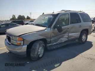 2003 GMC Yukon SLT z VIN 1GKEK13Z33J110365, wystawiony jako Copart lot #58697615 z przebiegiem 480 314 mil mil oraz Szkoda całkowita • Salvage title. Historia ofert i sprzedaży dostępna na DreamBid. Obrazek 1.