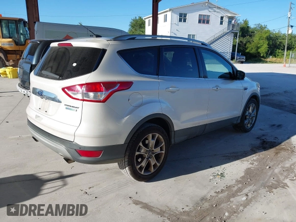 2015 Ford Escape Titanium with VIN 1FMCU0J96FUA48615, listed as a IAAI auction lot 39482355 with 186,340 mi miles and . Bid and sale history available at DreamBid. Image 4.