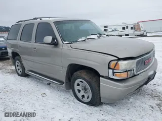 2001 GMC Yukon Denali with VIN 1GKEK63U21J222783, listed as a IAAI auction lot 41443565 with 1 mi miles. Bid and sale history available at carsss.com. Image 1.