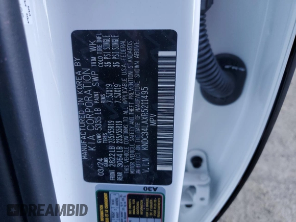 2024 Kia EV6 Wind with VIN KNDC34LAXR5211495, listed as a Copart auction lot 77227014 with 1,098 mi miles and Clean Title. Bid and sale history available at carsss.com. Image 13.