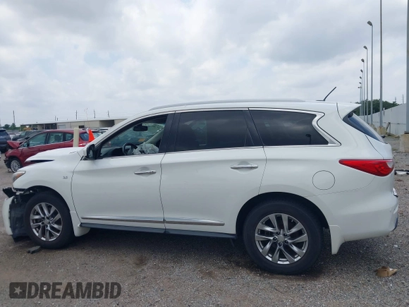 2014 Infiniti QX60 with VIN 5N1AL0MM8EC519291, listed as a IAAI auction lot 39510962 with 109,429 mi miles and . Bid and sale history available at DreamBid. Image 13.