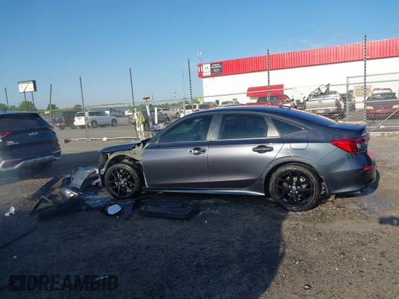 2024 Honda Civic Sport with VIN 2HGFE2F50RH522647, listed as a IAAI auction lot 42004321 with 30,768 mi miles and . Bid and sale history available at DreamBid. Image 14.