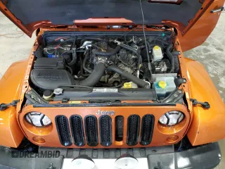 2011 Jeep Wrangler Sahara with VIN 1J4GA5D1XBL557392, listed as a Copart auction lot 56892835 with 109,567 mi miles and Clean title. Bid and sale history available at DreamBid. Image 12.