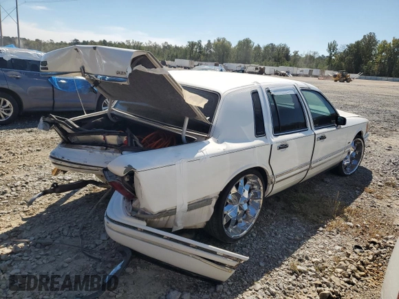 1994 Lincoln Town Car Signature z VIN 1LNLM82W7RY781174, wystawiony jako Copart lot #69642754 z przebiegiem 149 185 mil mil oraz Szkoda całkowita • Salvage title. Historia ofert i sprzedaży dostępna na DreamBid. Obrazek 3.