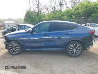 2023 BMW X6 xDrive40i z VIN 5UXCY6C07P9P85707, wystawiony jako IAAI lot #42075043 z przebiegiem 25 218 mil mil oraz . Historia ofert i sprzedaży dostępna na DreamBid. Obrazek 15.