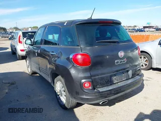 2014 FIAT 500L Easy with VIN ZFBCFABH6EZ028069, listed as a IAAI auction lot 41303148 with 131,757 mi miles and . Bid and sale history available at DreamBid. Image 3.