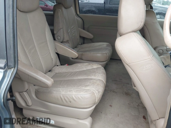 2006 Kia Sedona LX with VIN KNDMB233766015453, listed as a IAAI auction lot 41940305 with 189,319 mi miles. Bid and sale history available at carsss.com. Image 8.