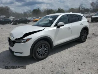 2021 Mazda CX-5 Touring with VIN JM3KFBCM4M0486469, listed as a Copart auction lot 51708075 with 57,182 mi miles and Salvage Title. Bid and sale history available at carsss.com. Image 1.
