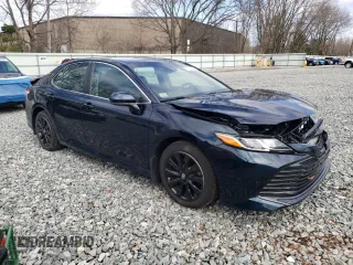 2020 Toyota Camry LE with VIN 4T1C11AK8LU954357, listed as a Copart auction lot 50153005 with 28,534 mi miles and Salvage Title. Bid and sale history available at DreamBid. Image 4.