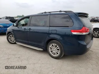 2012 Toyota Sienna XLE AAS with VIN 5TDYK3DC7CS216061, listed as a Copart auction lot 60596715 with 112,713 mi miles and Salvage title. Bid and sale history available at DreamBid. Image 2.