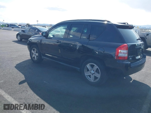 2010 Jeep Compass North Edition with VIN 1J4NF4FB3AD504356, listed as a IAAI auction lot 41924451 with 157,066 mi miles. Bid and sale history available at carsss.com. Image 3.