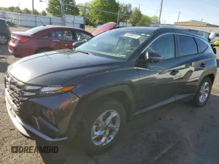 2022 Hyundai Tucson SEL z VIN 5NMJBCAEXNH106280, wystawiony jako Copart lot #55080815 z przebiegiem 26 943 mil mil oraz Szkody całkowita. Historia ofert i sprzedaży dostępna na DreamBid. Obrazek 1.