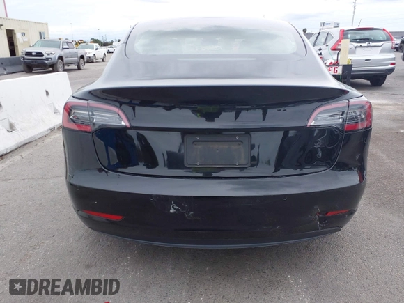 2022 Tesla Model 3 with VIN 5YJ3E1EA7NF314744, listed as a IAAI auction lot 42057596 with 30,936 mi miles and . Bid and sale history available at DreamBid. Image 16.
