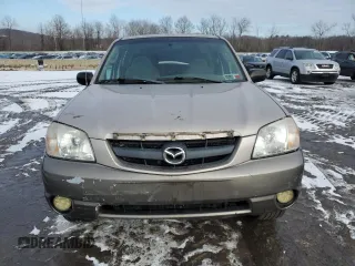 2001 Mazda Tribute LX with VIN 4F2CU081X1KM70119, listed as a Copart auction lot 89311935 with 176,851 mi miles and Salvage Title. Bid and sale history available at DreamBid. Image 5.