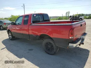 1998 Ford F-150 with VIN 1FTZX1765WKA88964, listed as a Copart auction lot 57334945 with 172,672 mi miles and Salvage title. Bid and sale history available at DreamBid. Image 2.