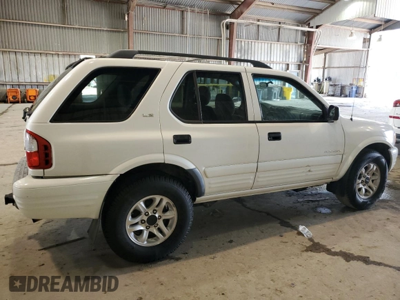 2002 Isuzu Rodeo S with VIN 4S2CK58W724316668, listed as a Copart auction lot 72154754 with 141,590 mi miles and Salvage Title. Bid and sale history available at DreamBid. Image 3.