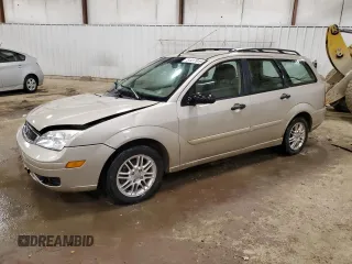 2006 Ford Focus SE z VIN 1FAFP36N96W220999, wystawiony jako Copart lot #51417915 z przebiegiem 92 507 mil mil oraz Czysty tytuł • Clean title. Historia ofert i sprzedaży dostępna na DreamBid. Obrazek 1.