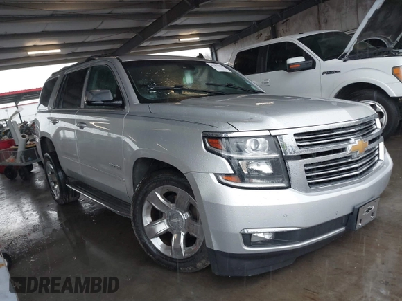 2015 Chevrolet Tahoe LTZ with VIN 1GNSCCKC5FR123099, listed as a IAAI auction lot 41391974 with Not provided miles and . Bid and sale history available at DreamBid. Image 1.