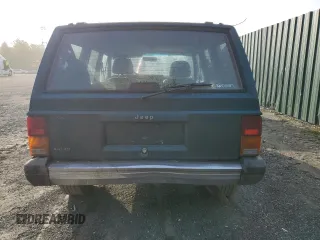 1996 Jeep Cherokee Country with VIN 1J4FJ78S9TL252803, listed as a Copart auction lot 49278184 with 180,420 mi miles and Clean Title. Bid and sale history available at carsss.com. Image 6.