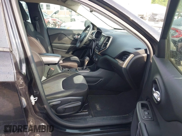 2014 Jeep Cherokee Sport with VIN 1C4PJLAB1EW221415, listed as a IAAI auction lot 42170364 with 182,813 mi miles and . Bid and sale history available at DreamBid. Image 5.