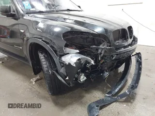 2012 BMW X5 35d z VIN 5UXZW0C58CL671740, wystawiony jako IAAI lot #41158203 z przebiegiem 97 451 mil mil oraz . Historia ofert i sprzedaży dostępna na DreamBid. Obrazek 6.