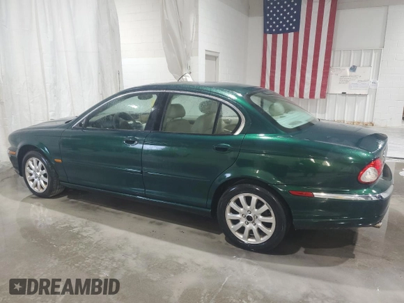 2003 Jaguar X-Type 2.5L Manual z VIN SAJEA51D63XD54591, wystawiony jako Copart lot #57638355 z przebiegiem 93 905 mil mil oraz Szkoda całkowita • Salvage title. Historia ofert i sprzedaży dostępna na DreamBid. Obrazek 2.