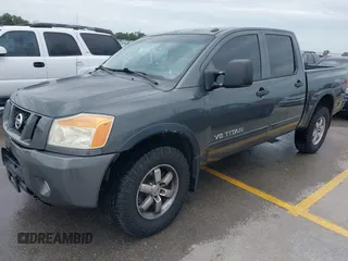 2010 Nissan Titan Pro-4X with VIN 1N6BA0EC9AN323943, listed as a IAAI auction lot 42795482 with 200,453 mi miles and . Bid and sale history available at DreamBid. Image 18.