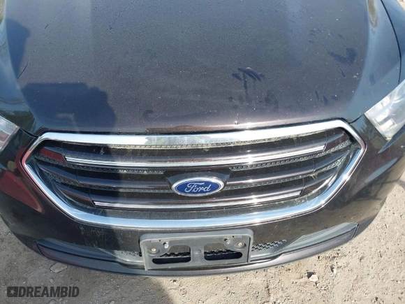 2013 Ford Taurus Limited with VIN 1FAHP2F85DG188511, listed as a IAAI auction lot 42077614 with 165,059 mi miles. Bid and sale history available at carsss.com. Image 6.