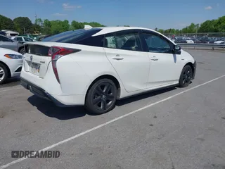 2017 Toyota Prius Two with VIN JTDKARFU4H3051645, listed as a IAAI auction lot 41991804 with 301,338 mi miles. Bid and sale history available at carsss.com. Image 4.