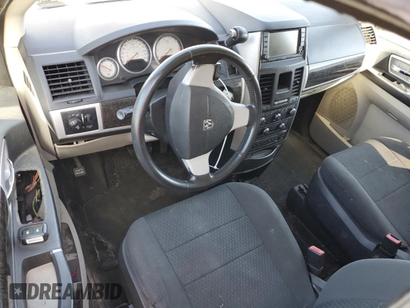 2010 Dodge Grand Caravan SXT with VIN 2D4RN5D17AR307328, listed as a Copart auction lot 49983425 with Not Provided miles and Clean Title. Bid and sale history available at DreamBid. Image 8.