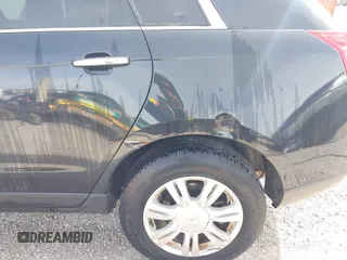 2012 Cadillac SRX Luxury Collection with VIN 3GYFNAE37CS651847, listed as a IAAI auction lot 41929524 with 144,961 mi miles and . Bid and sale history available at carsss.com. Image 6.