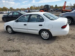 1996 Geo Prizm z VIN 1Y1SK5261TZ028032, wystawiony jako Copart lot #77434654 z przebiegiem 54 665 mil mil oraz Tytuł czysty. Historia ofert i sprzedaży dostępna na DreamBid. Obrazek 2.