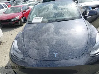 2025 Tesla Model Y Long Range with VIN 7SAYGDED3SA352138, listed as a IAAI auction lot 41760798 with 1,209 mi miles and . Bid and sale history available at DreamBid. Image 10.