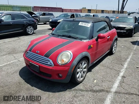 2010 MINI Convertible с VIN WMWMR3C59ATU97966, выставлен на аукционе Copart как лот 59870035 с пробегом 124 132 миль миль и Списание • Salvage title. История ставок и продаж доступна на DreamBid. Изображение 13.