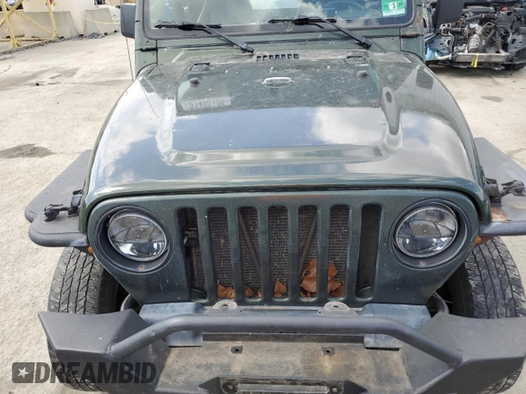 1998 Jeep Wrangler Sahara с VIN 1J4FY49S3WP724645, выставлен на аукционе Copart как лот 51450105 с пробегом 187 932 миль миль и Чистый • Clean title. История ставок и продаж доступна на DreamBid. Изображение 11.