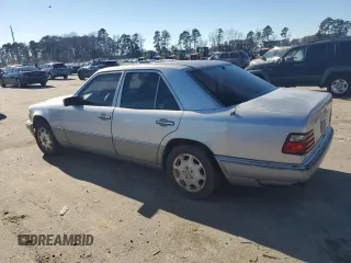 1995 Mercedes-Benz E Class with VIN WDBEA32EXSC163851, listed as a Copart auction lot 88441005 with 154,086 mi miles and Clean Title. Bid and sale history available at carsss.com. Image 2.