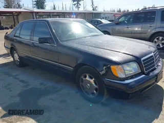 1995 Mercedes-Benz S with VIN WDBGA43E6SA228817, listed as a IAAI auction lot 41871143 with 104,274 mi miles and . Bid and sale history available at DreamBid. Image 1.