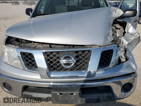 2010 Nissan Frontier XE with VIN 1N6BD0CT1AC427994, listed as a Copart auction lot 71574484 with 121,102 mi miles and Salvage title. Bid and sale history available at DreamBid. Image 11.