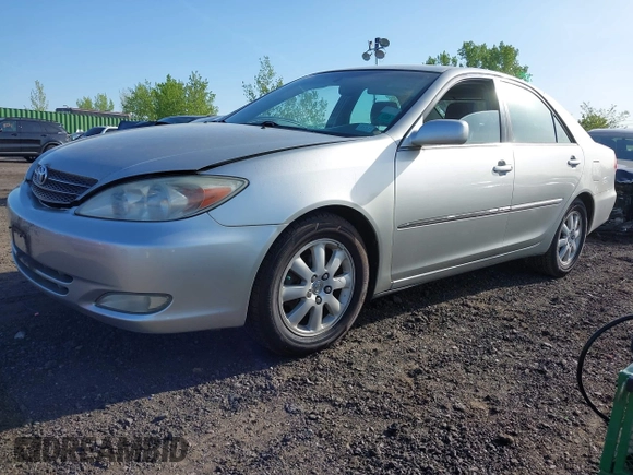 2003 Toyota Camry LE with VIN 4T1BE30K43U227357, listed as a IAAI auction lot 42144237 with 101,135 mi miles and . Bid and sale history available at DreamBid. Image 2.