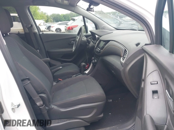 2020 Chevrolet Trax LS with VIN 3GNCJKSB1LL304974, listed as a IAAI auction lot 42428127 with 33,779 mi miles and . Bid and sale history available at DreamBid. Image 5.