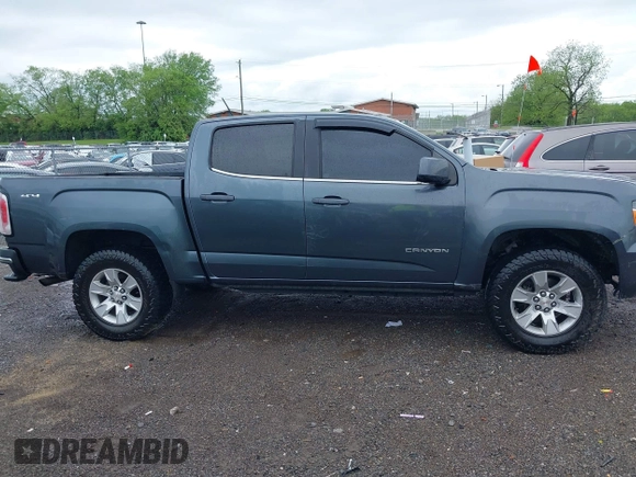 2015 GMC Canyon 4WD SLE with VIN 1GTG6BE3XF1153421, listed as a IAAI auction lot 42079375 with 161,379 mi miles and . Bid and sale history available at carsss.com. Image 13.