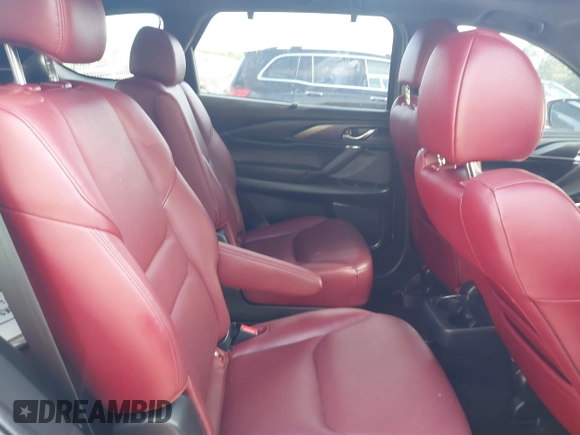 2021 Mazda CX-9 Grand Touring with VIN JM3TCADY7M0528223, listed as a IAAI auction lot 42395861 with 57,767 mi miles and . Bid and sale history available at DreamBid. Image 8.