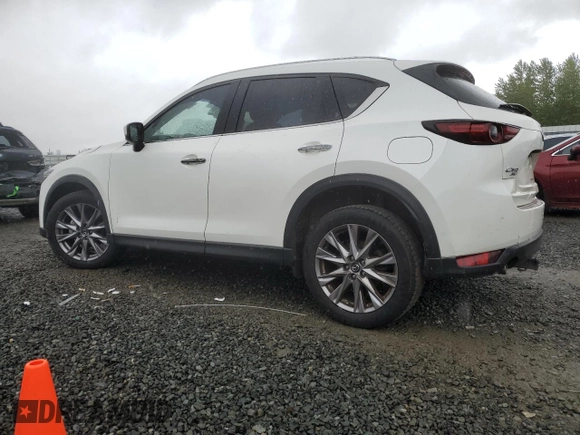 2019 Mazda CX-5 Grand Touring with VIN JM3KFBDM4K0669589, listed as a Copart auction lot 54948455 with 64,475 mi miles and Salvage Title. Bid and sale history available at carsss.com. Image 2.