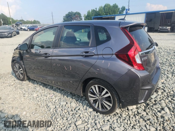 2015 Honda Fit EX-L with VIN 3HGGK5H87FM708737, listed as a Copart auction lot 64310745 with 90,446 mi miles and Salvage title. Bid and sale history available at DreamBid. Image 2.